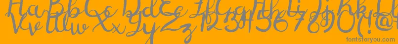 DigoryDoodlesPs-Schriftart – Graue Schriften auf orangefarbenem Hintergrund