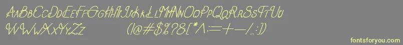 OldAlphaItalic-fontti – keltaiset fontit harmaalla taustalla