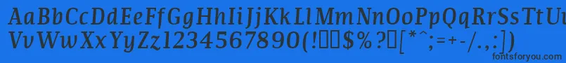 Commi Font – Black Fonts on Blue Background