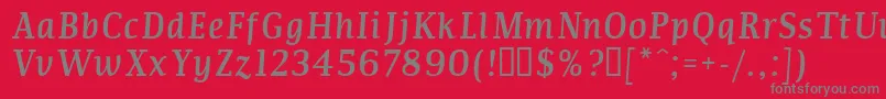 フォントCommi – 赤い背景に灰色の文字