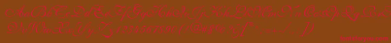 ShelleyLtVolanteScript-Schriftart – Rote Schriften auf braunem Hintergrund