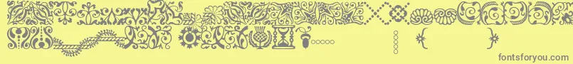 AdobeCaslonOrnaments Font – Gray Fonts on Yellow Background