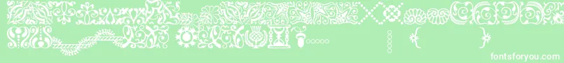 AdobeCaslonOrnaments Font – White Fonts on Green Background
