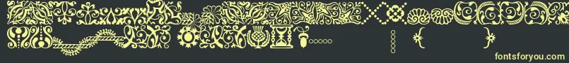 AdobeCaslonOrnaments Font – Yellow Fonts on Black Background
