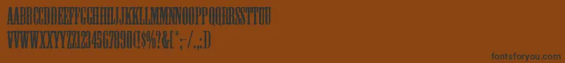 フォントMesquite – 黒い文字が茶色の背景にあります
