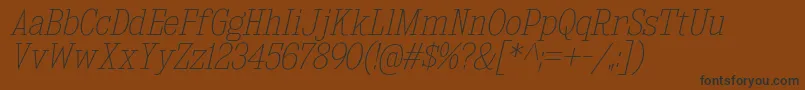 KingsbridgeScUlIt Font – Black Fonts on Brown Background