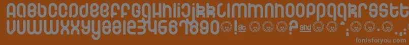 Schmotto-fontti – harmaat kirjasimet ruskealla taustalla