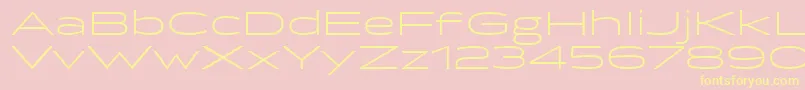 フォントBrillerLight – 黄色のフォント、ピンクの背景