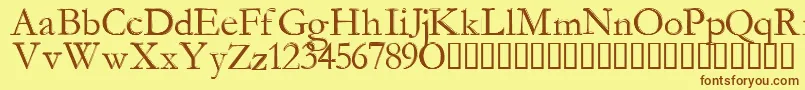 フォントManaMana – 茶色の文字が黄色の背景にあります。