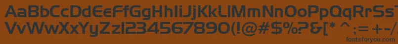 フォントHandgotn – 黒い文字が茶色の背景にあります