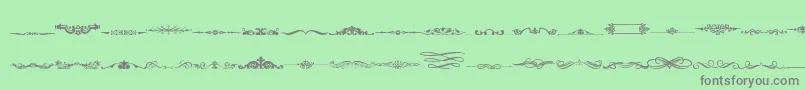 フォントVintageDecorativeSigns4 – 緑の背景に灰色の文字