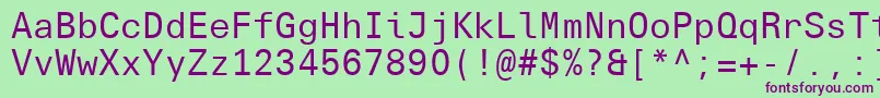 UniversNextTypewriterProRegular-fontti – violetit fontit vihreällä taustalla