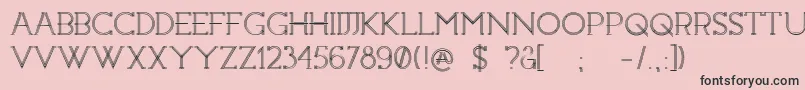フォントConstrocktion – ピンクの背景に黒い文字