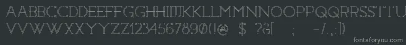 Constrocktion-fontti – harmaat kirjasimet mustalla taustalla