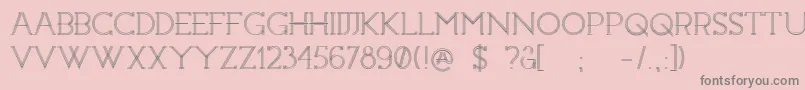 フォントConstrocktion – ピンクの背景に灰色の文字