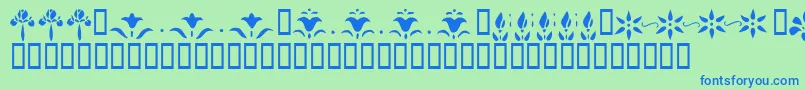 Czcionka KrFleurFlairLines – niebieskie czcionki na zielonym tle