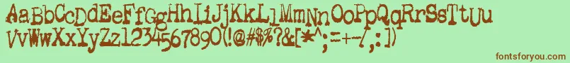 GutterVomit Font – Brown Fonts on Green Background