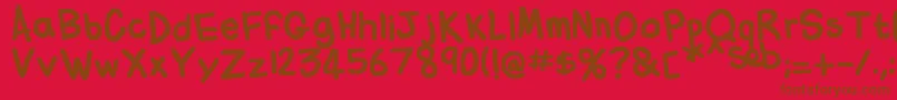 Fonte FlabbyBumsHandwriting – fontes marrons em um fundo vermelho
