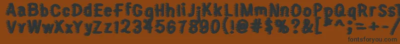Sweater Font – Black Fonts on Brown Background
