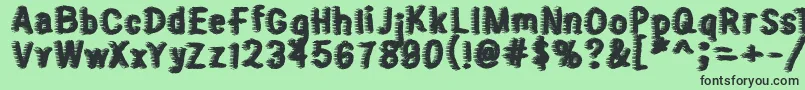 フォントSweater – 緑の背景に黒い文字