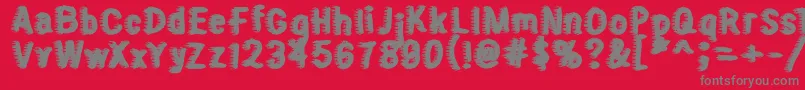 Fonte Sweater – fontes cinzas em um fundo vermelho