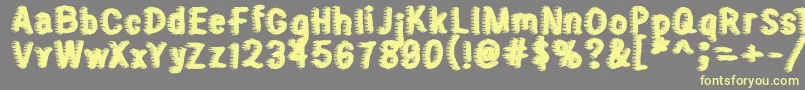 Sweater Font – Yellow Fonts on Gray Background