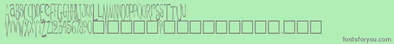 DaytripperPlain Font – Gray Fonts on Green Background