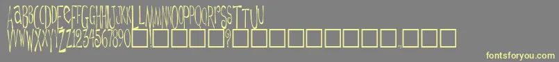 DaytripperPlain Font – Yellow Fonts on Gray Background