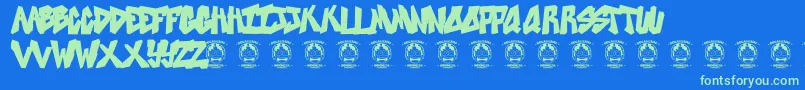 Sweetasrevenge-Schriftart – Grüne Schriften auf blauem Hintergrund