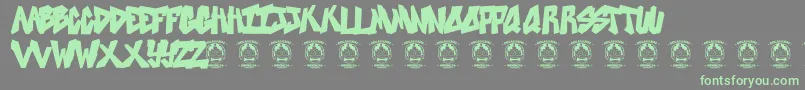 Sweetasrevenge-Schriftart – Grüne Schriften auf grauem Hintergrund