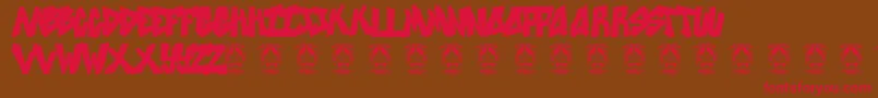 フォントSweetasrevenge – 赤い文字が茶色の背景にあります。