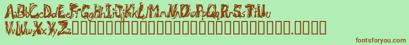 Retsuc Font – Brown Fonts on Green Background