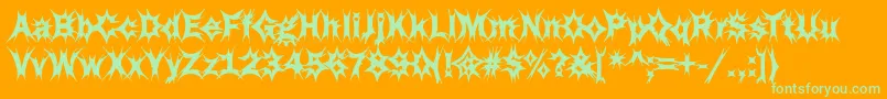 Funky34Bold-Schriftart – Grüne Schriften auf orangefarbenem Hintergrund