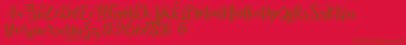 Bromello-Schriftart – Braune Schriften auf rotem Hintergrund