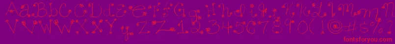 Daisymae-Schriftart – Rote Schriften auf violettem Hintergrund