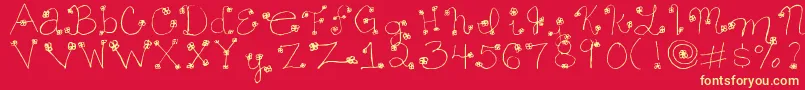 フォントDaisymae – 黄色の文字、赤い背景