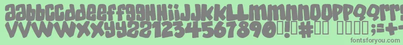 Skatd Font – Gray Fonts on Green Background