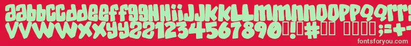 Skatd Font – Green Fonts on Red Background