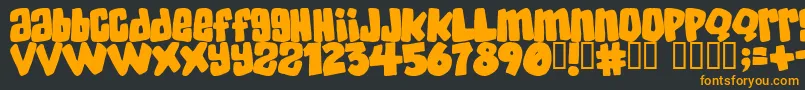 Skatd Font – Orange Fonts on Black Background