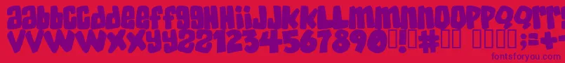 Skatd-Schriftart – Violette Schriften auf rotem Hintergrund