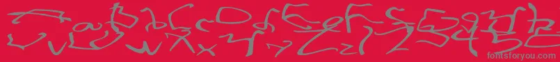 StretchedStrungWide-Schriftart – Graue Schriften auf rotem Hintergrund
