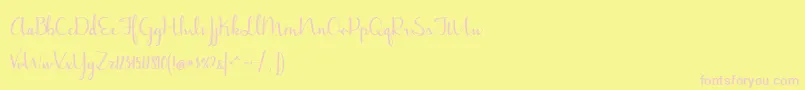 JasmineReminiscentseBold-fontti – vaaleanpunaiset fontit keltaisella taustalla