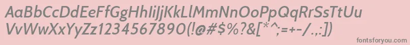 CabinMediumitalic-fontti – harmaat kirjasimet vaaleanpunaisella taustalla