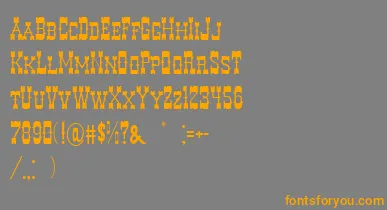 DecreeArtTwo font – Orange Fonts On Gray Background