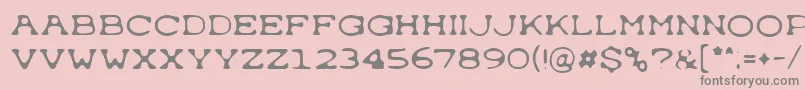 Fonte Typewron – fontes cinzas em um fundo rosa