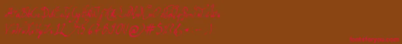 Czcionka GracefulRegular – czerwone czcionki na brązowym tle