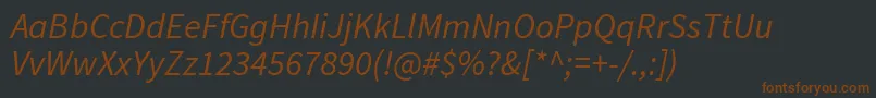 Шрифт SourcesansproItalic – коричневые шрифты на чёрном фоне