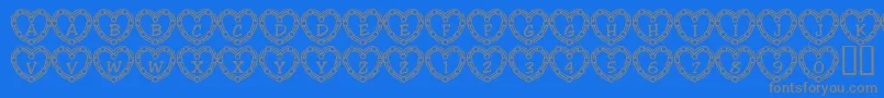 Fonte 101HeartDeco – fontes cinzas em um fundo azul