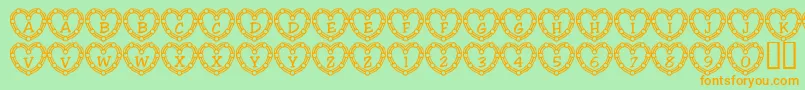 101HeartDeco-fontti – oranssit fontit vihreällä taustalla