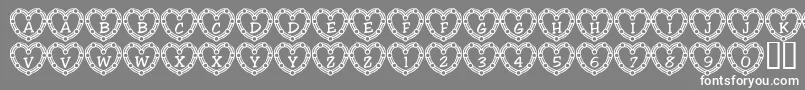 フォント101HeartDeco – 灰色の背景に白い文字